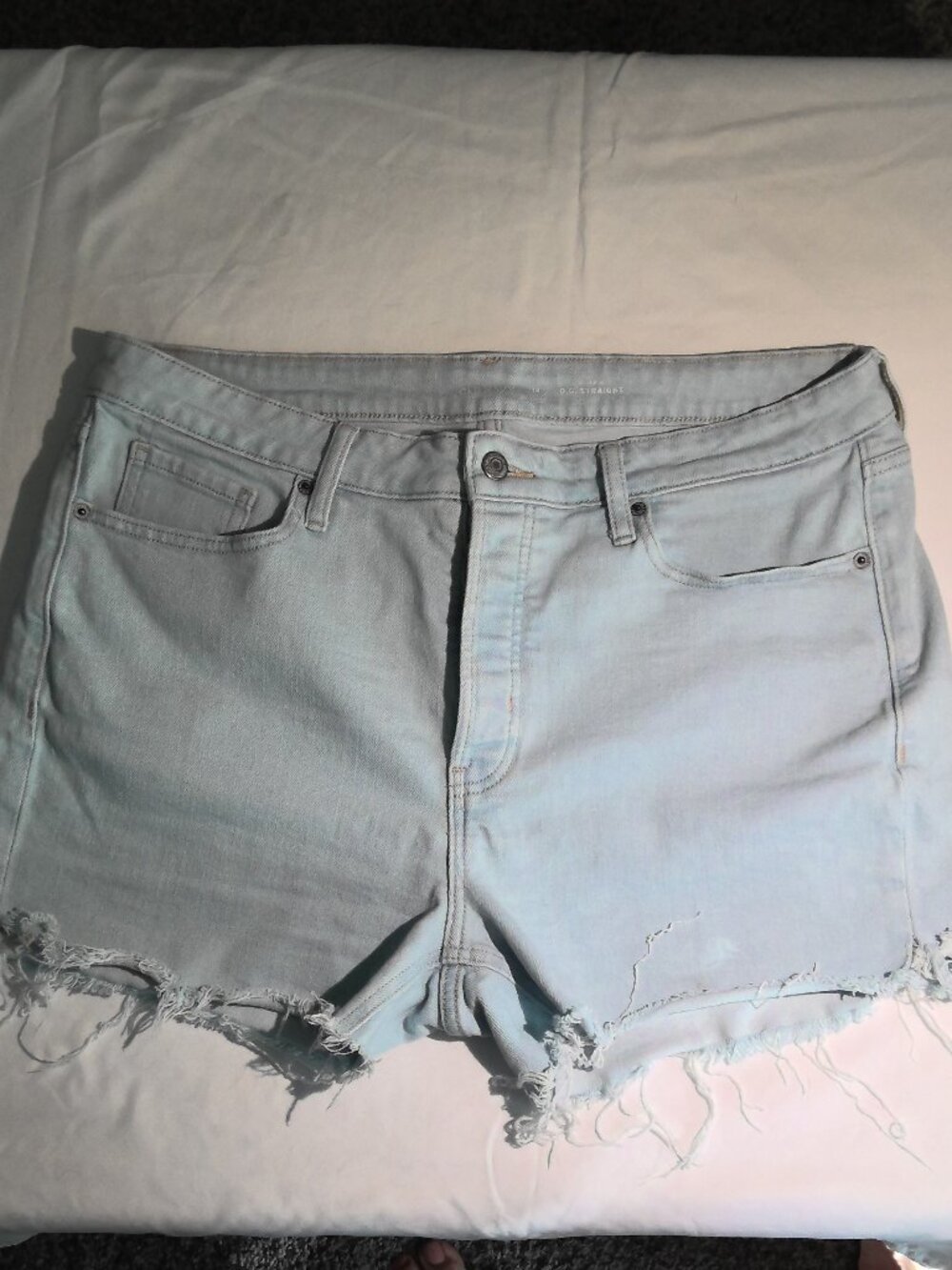 High-Rise Distressed Light Wash Cut-off Jean Shorts